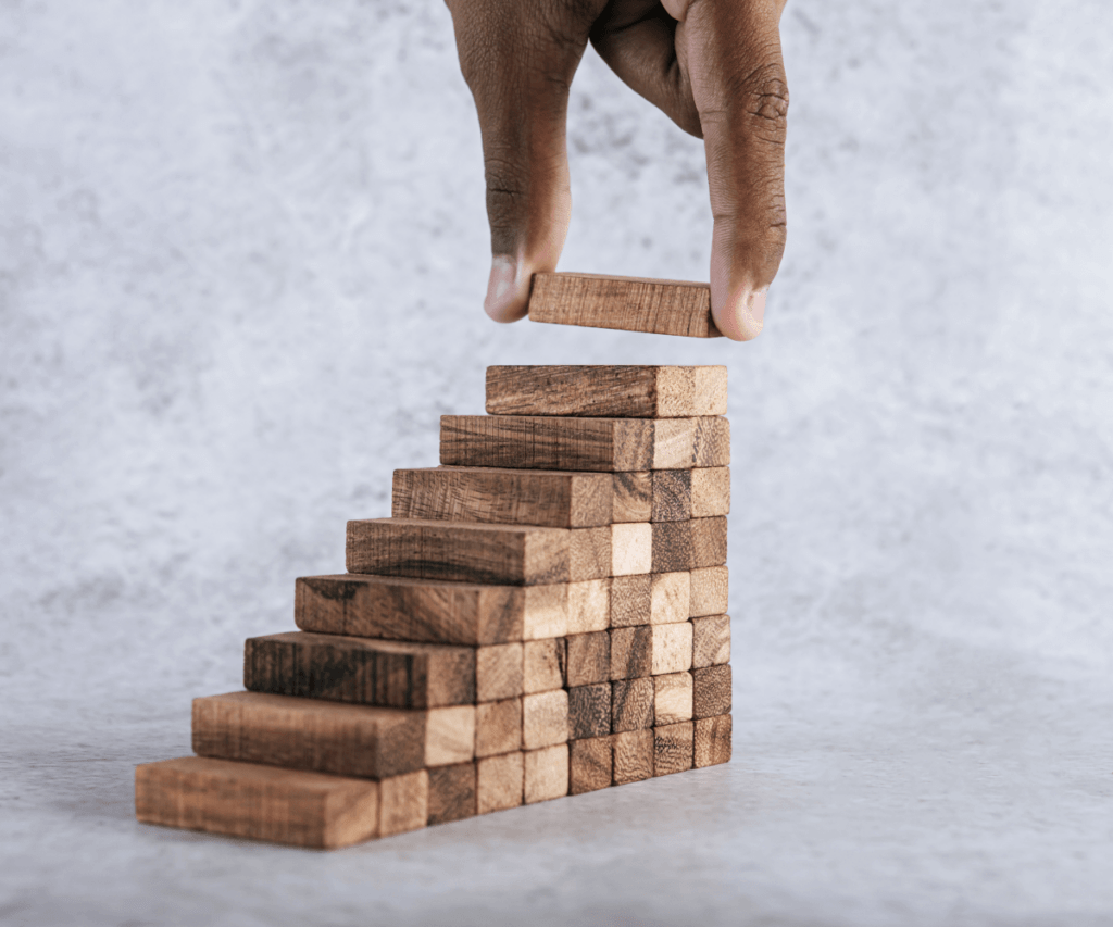 hand-stacking-bricks